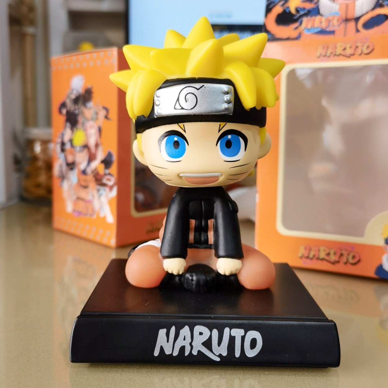 mo-hinh-naruto-lắc-dau-cao-135cm-ngang-9cm-doc-7cm-nặng-200g-fullbox-1 Mô hình Naruto lắc đầu cao 13,5cm ngang 9cm dọc 7cm nặng 200g